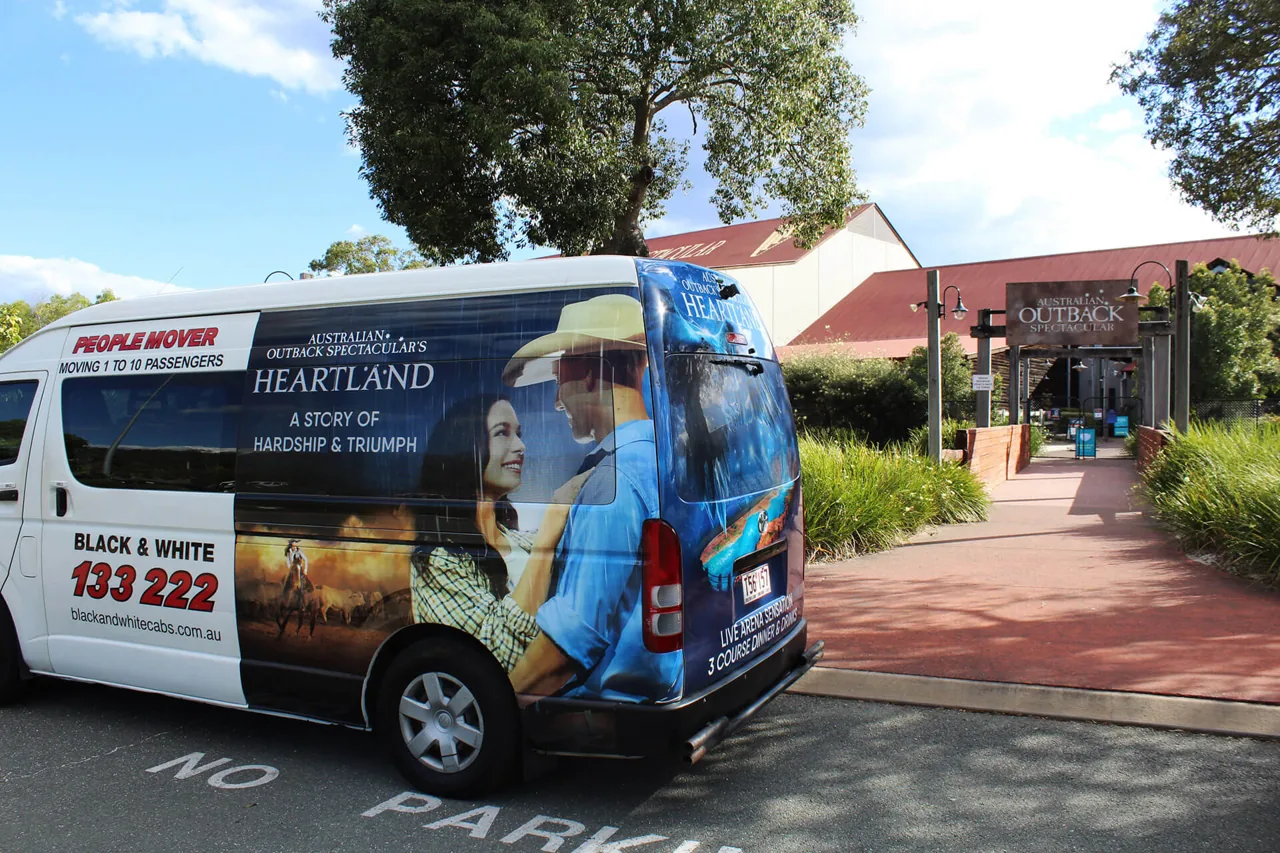 Adflow full taxi wrap for Australian Outback Spectacular 'Heartland' on a Black & White Cabs people-mover van (Adflow's fleet partner), Australia