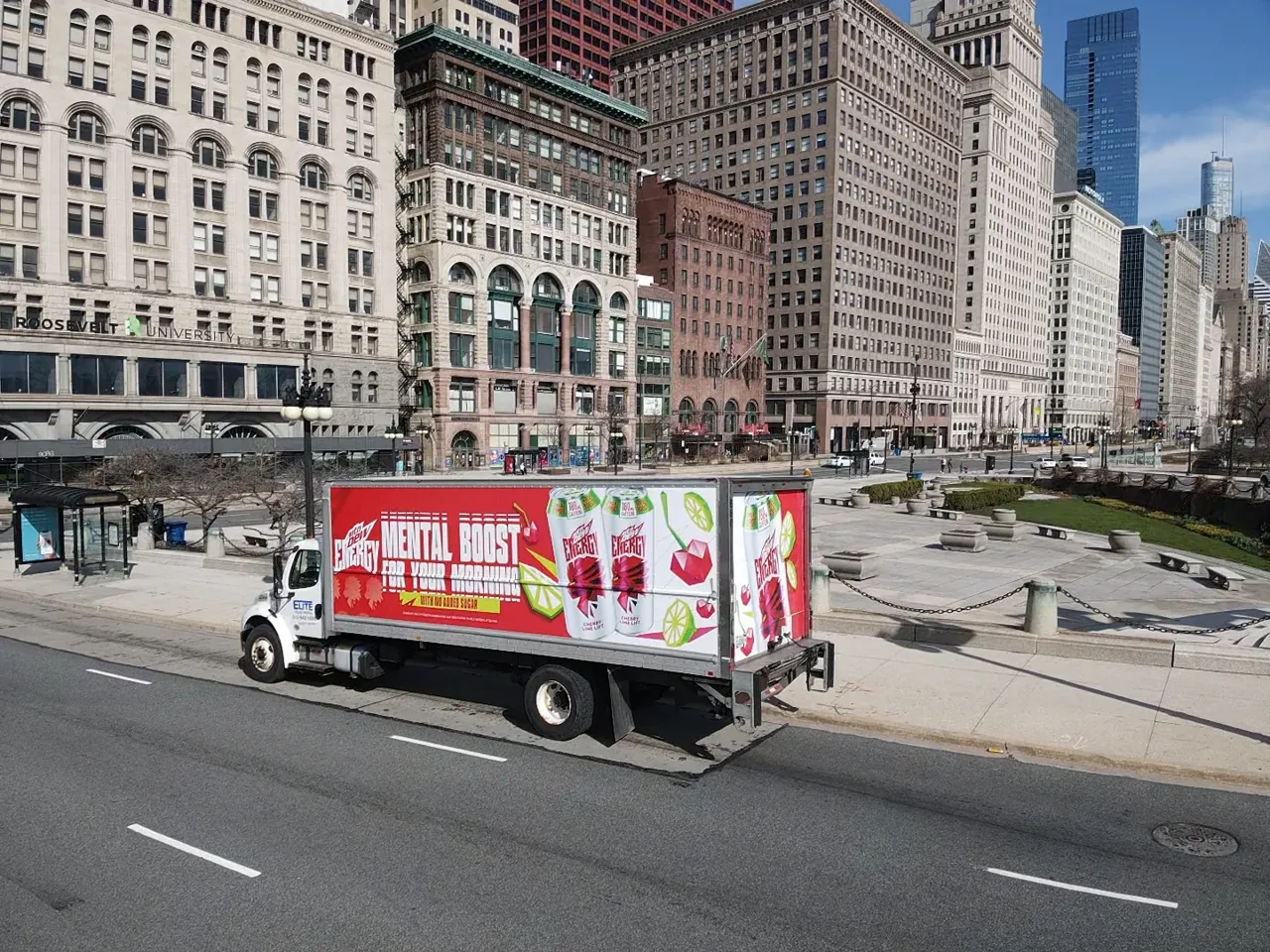 Mtn Dew Energy Cherry Lime Lift box-truck mobile billboard on a downtown Chicago street, Adgile Media Group virtual fleet