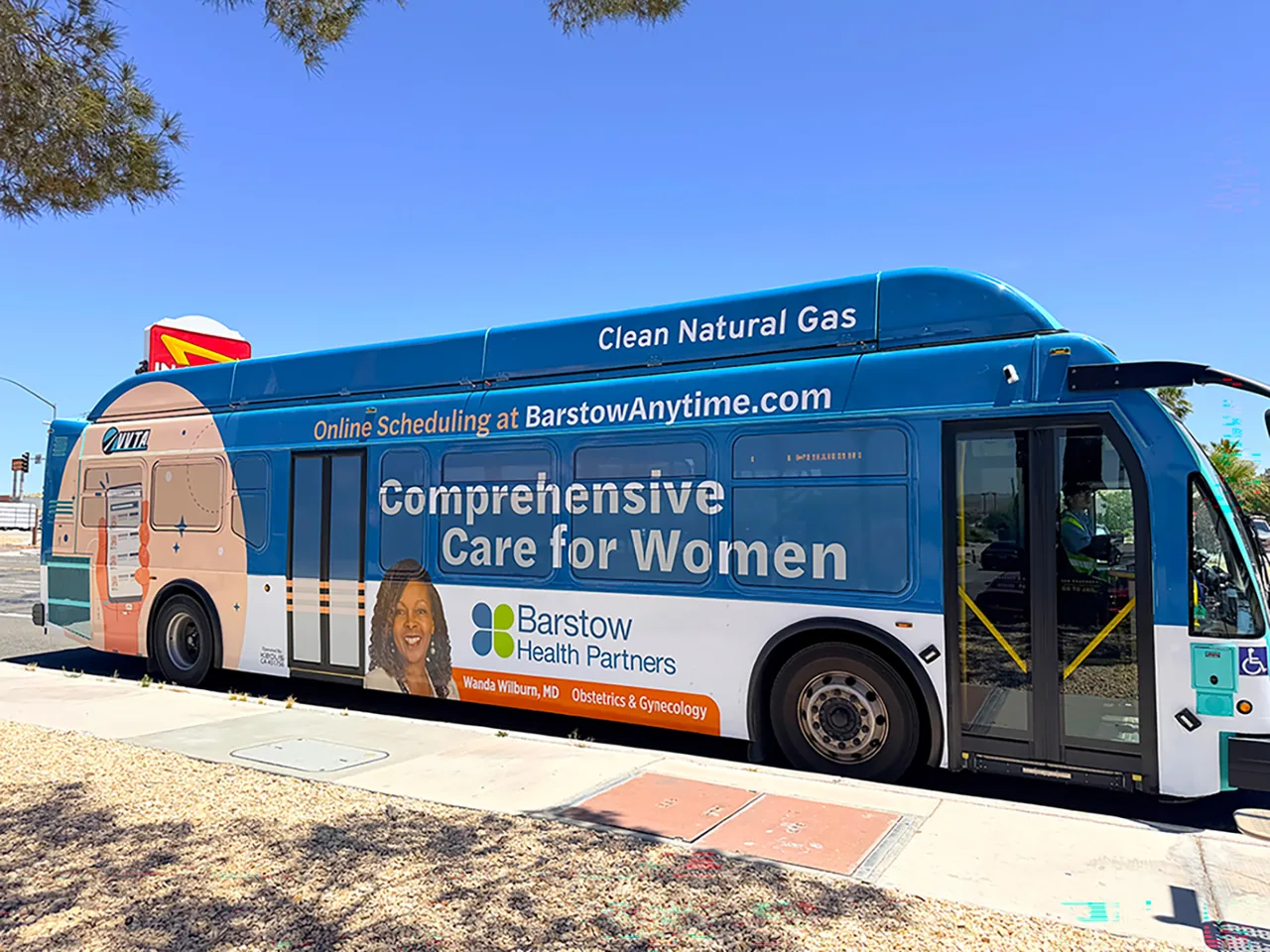 Barstow Health Partners full bus wrap ('Comprehensive Care for Women') on a VVTA transit bus, by Adsposure