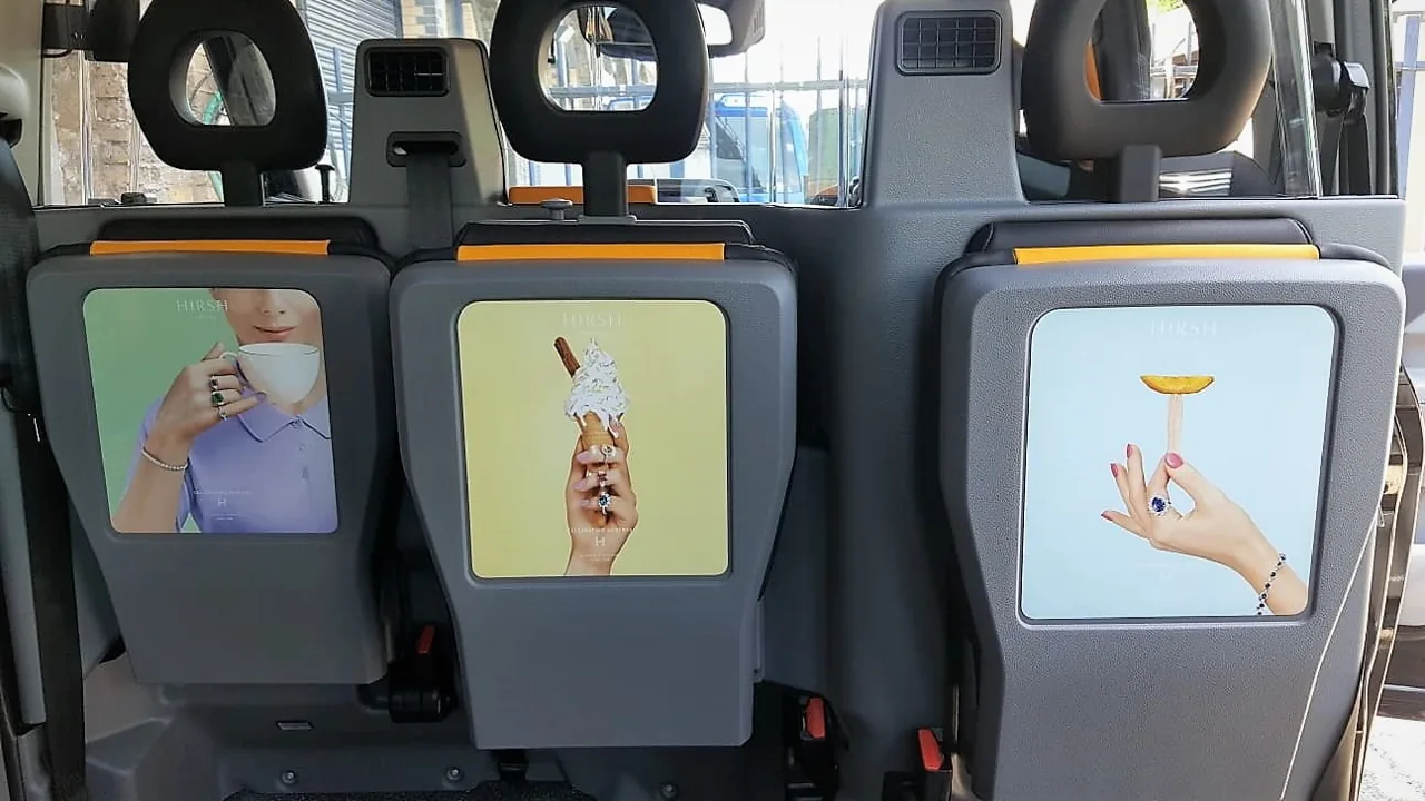 Hirsh in-taxi tip-seat / interior advertising panel (Cabspace Media)