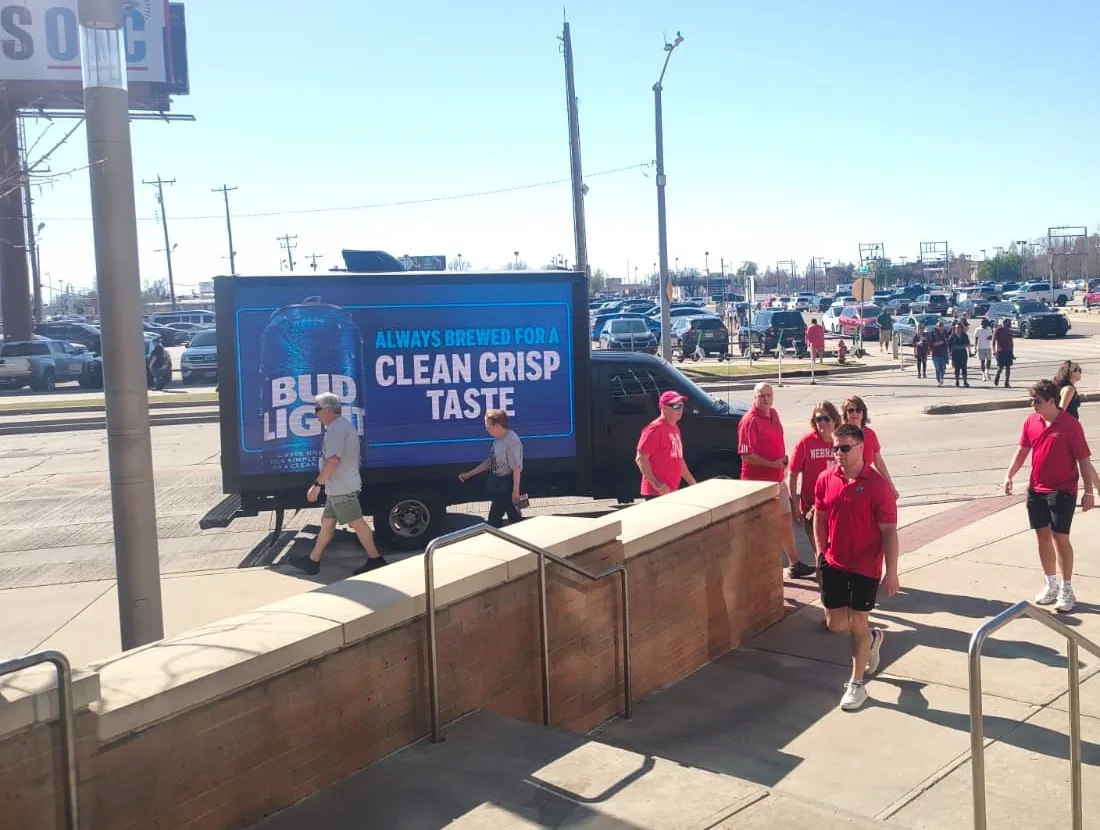 Bud Light digital LED mobile billboard truck ('Always Brewed For A Clean Crisp Taste') at an event, by CAN'T MISS US