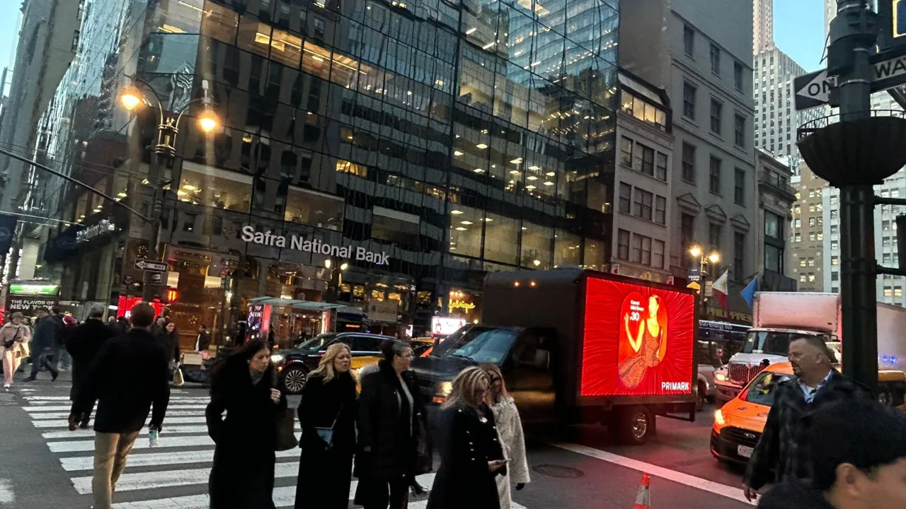 Primark digital LED mobile billboard truck on a Manhattan street at dusk, by CAN'T MISS US