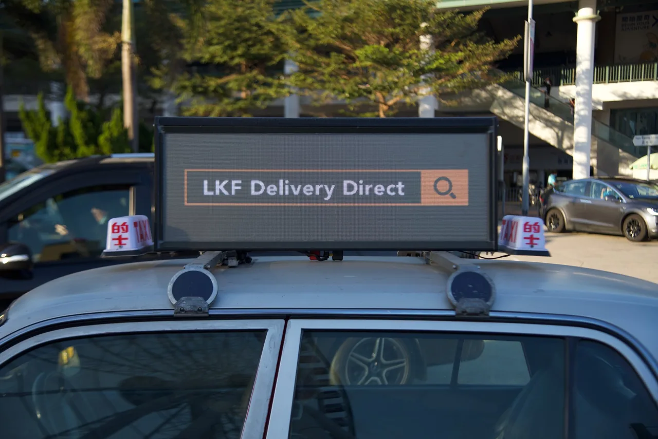 Fleet of taxis carrying Captive 8 digital-top LED billboards across Hong Kong