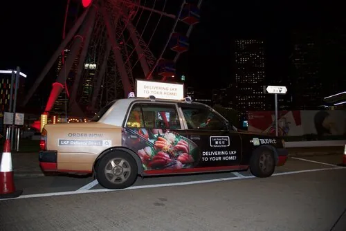 Digital Top LED display on a taxi at night, Captive 8 OOH campaign