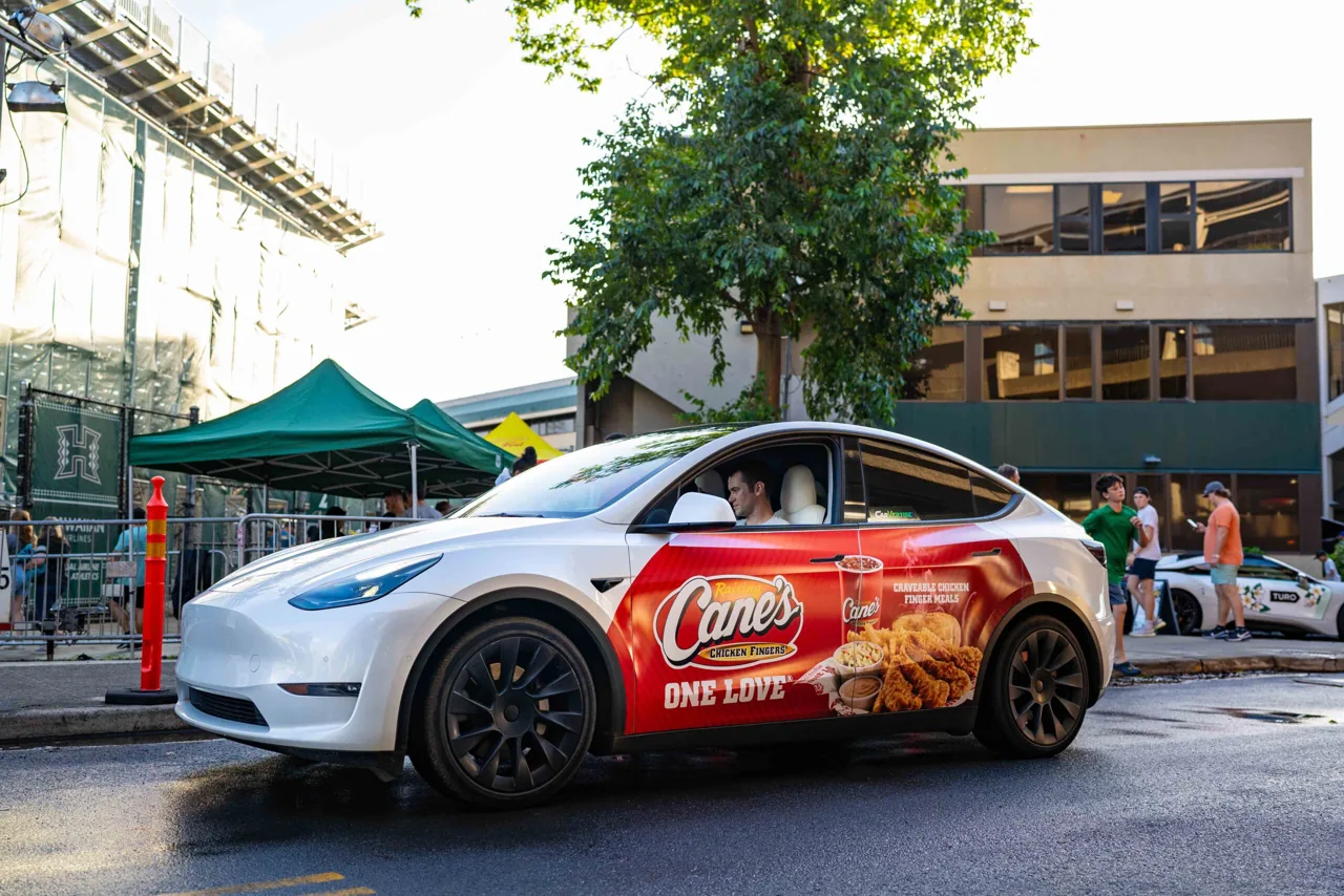 Raising Cane's rideshare car wrap (Carvertise campaign)