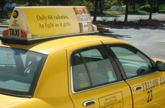 Miller Genuine Draft 64 'Only 64 calories' taxi-top on a Yellow Cab — CVA Miller Genuine Draft 64 case study