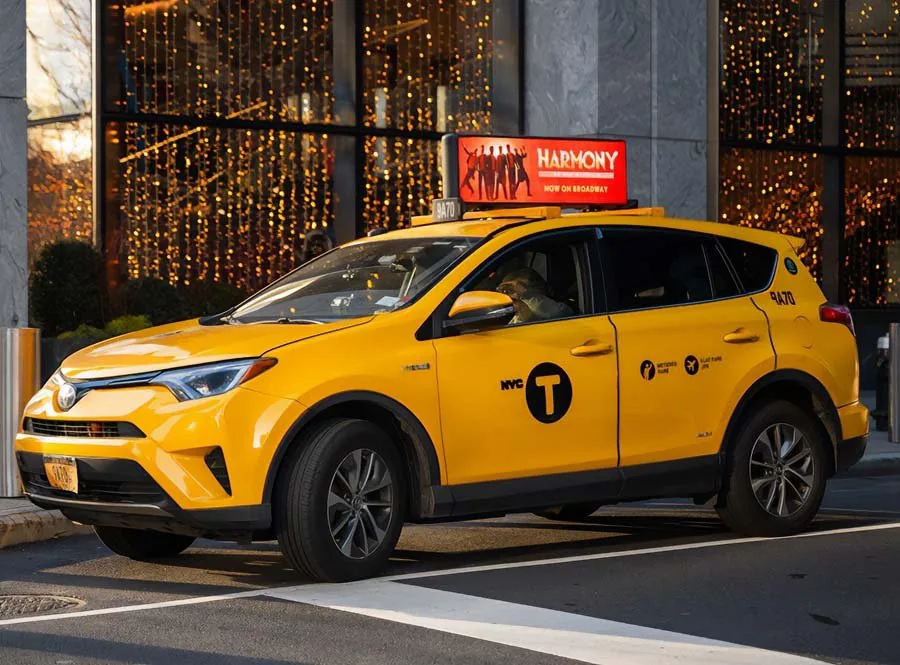 Firefly digital rooftop top on an NYC taxi (Harmony/Broadway creative)