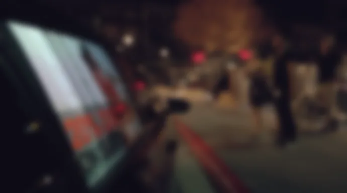 Grabb-it car-window video display running curbside at night, featured image from Sixteen:Nine / invidis coverage of Grabb-it turning rideshare cars into rolling digital OOH screens.