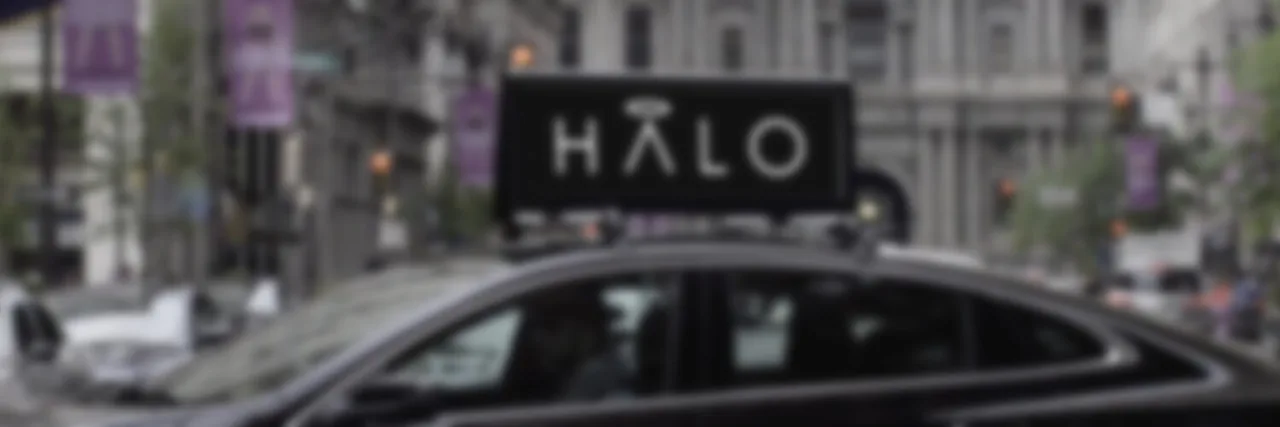Halo Cars car-top digital display on a rideshare vehicle (Sixteen:Nine / invidis coverage of the Lyft acquisition)