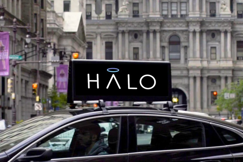 Halo Cars connected car-top ad screen mounted on a rideshare car (Engadget, credit: Halo Cars)