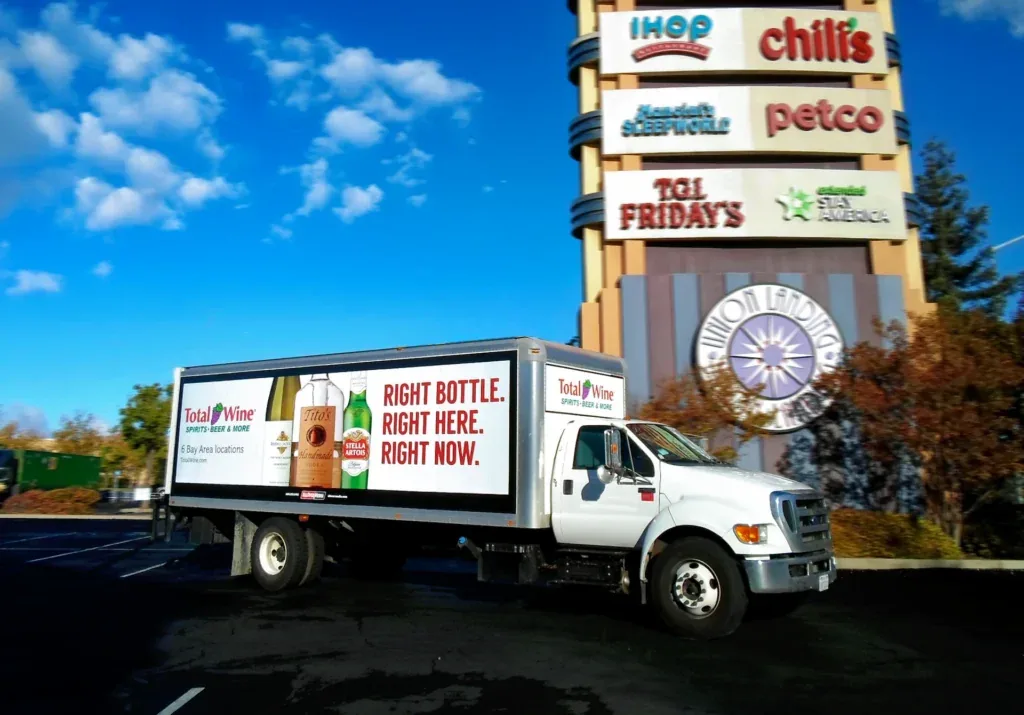 Total Wine & More truckside wrap on a mobile billboard truck (Momentara official site)