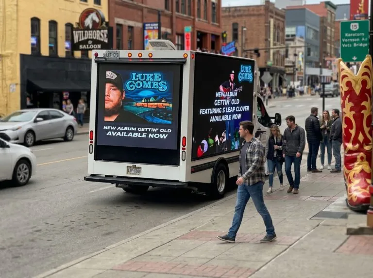 Luke Combs music promotion on a digital truckside LED screen (Momentara official site)