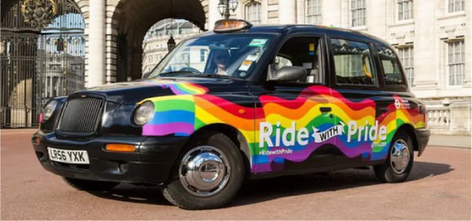 "Ride with Pride" rainbow taxi wrap on a London black cab, featured on Movia Media's taxi advertising page.