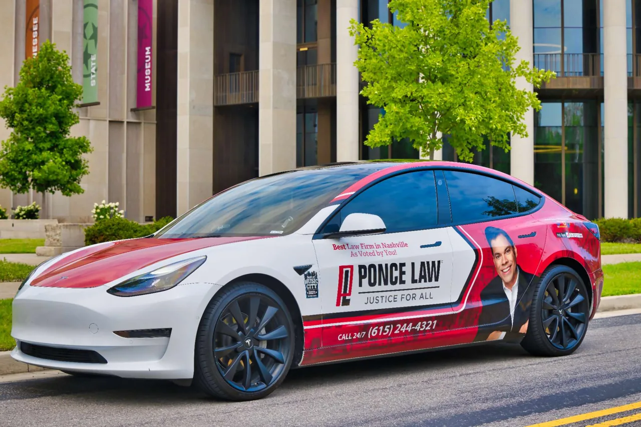 Ponce Law full car wrap on a white Tesla Model 3 (Nashville) - Nickelytics rideshare wrap campaign