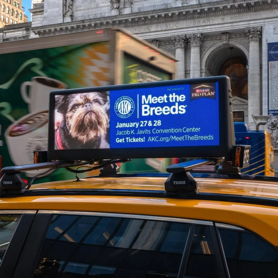 AKC campaign on a dynamic high-definition digital LED taxi-top display (NY Taxi Ads formats page)
