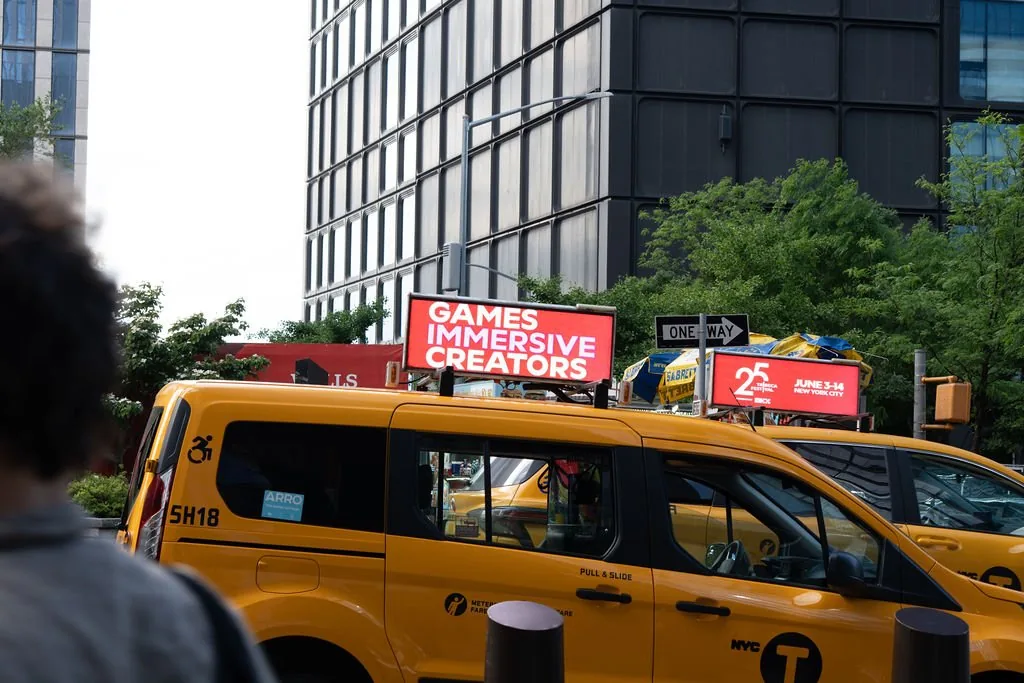 Tribeca Film Festival campaign on an NYC taxi-top display, June 2026 (NY Taxi Ads)