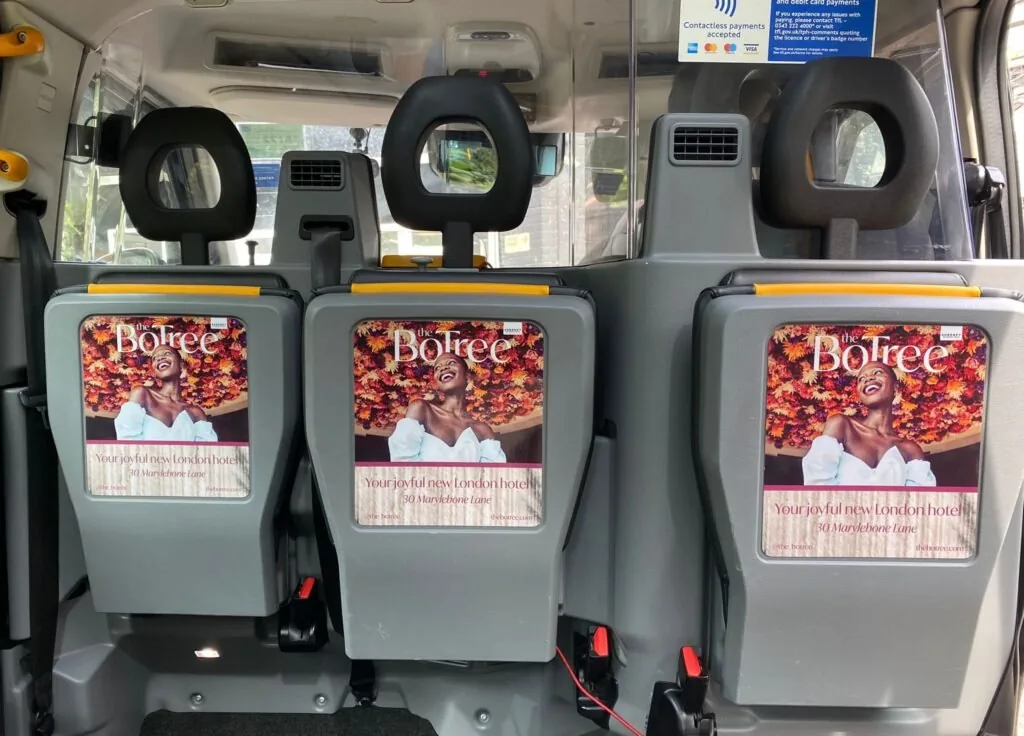 The BoTree London hotel ads on taxi interior seat-back tip-seat panels, One Day agency taxi interior advertising