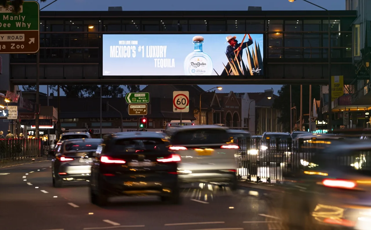 Don Julio Tequila on an oOh!media overhead digital roadside billboard, Military Road NSW at dusk