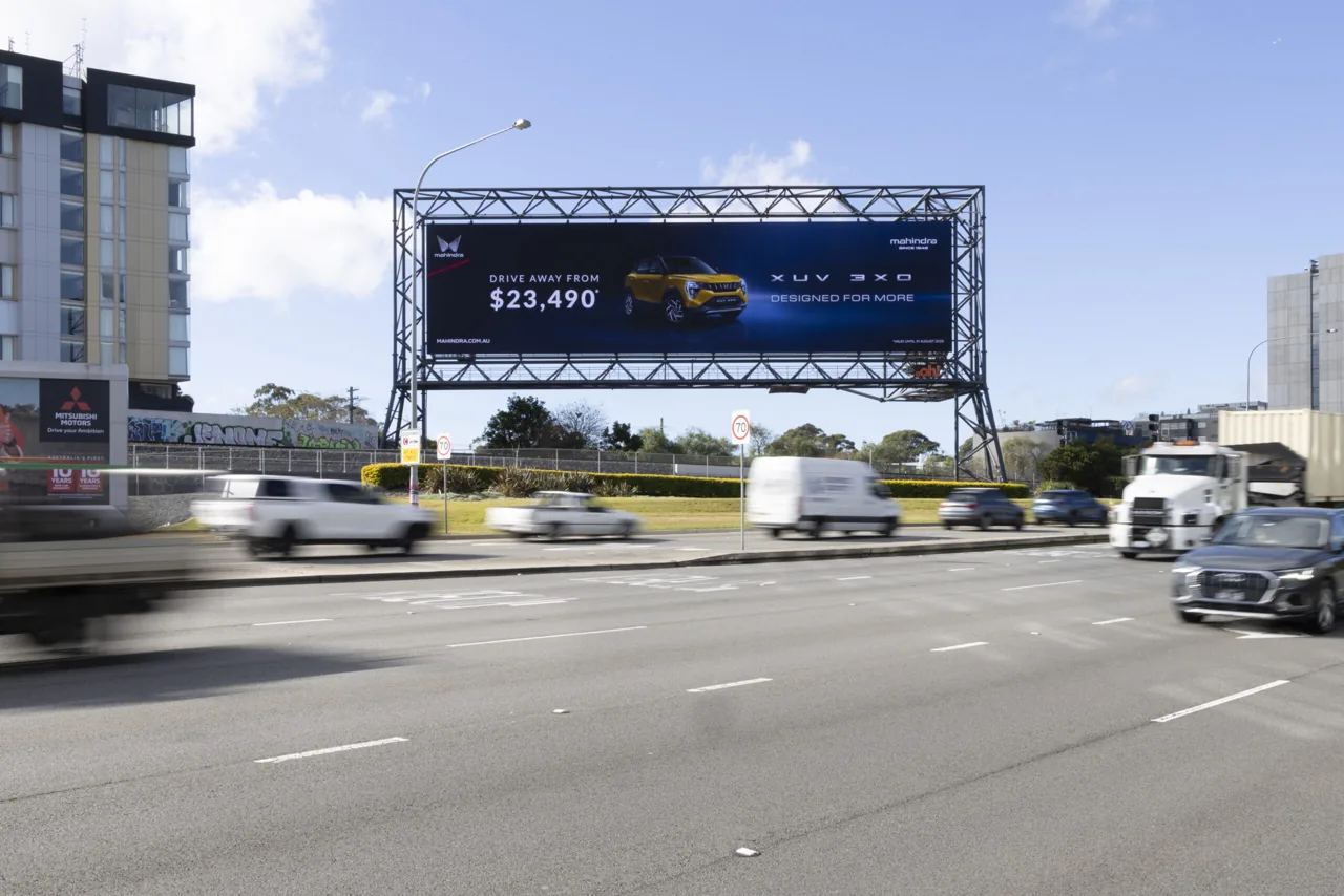 Mahindra XUV 3XO launch on an oOh!media large-format roadside billboard over a Sydney highway