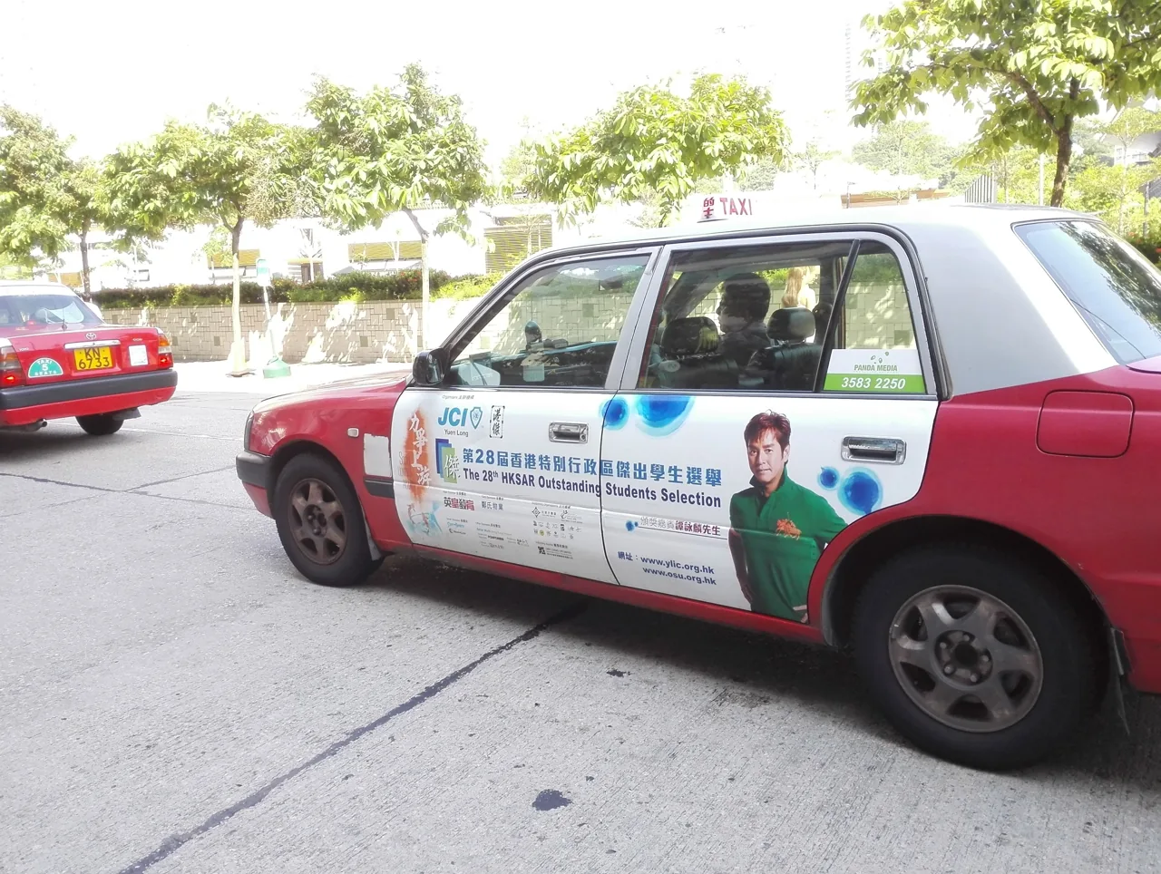 Hong Kong taxi advertising execution featured on Panda Media taxi service page