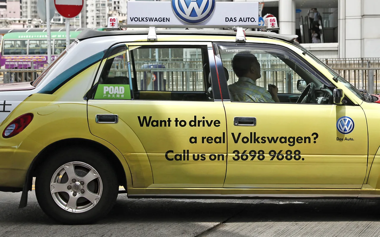 Volkswagen full-body Megaside wrap on a Hong Kong taxi