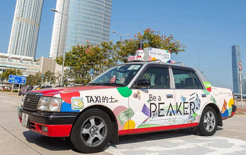 Hang Lung 3D taxi-top sign mounted on a taxi roof