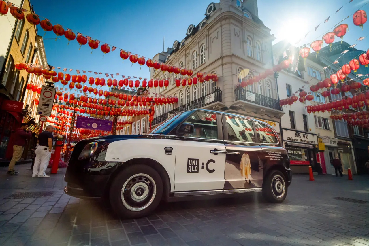 UNIQLO:C full black-cab wrap by Sherbet, photographed in London's Chinatown