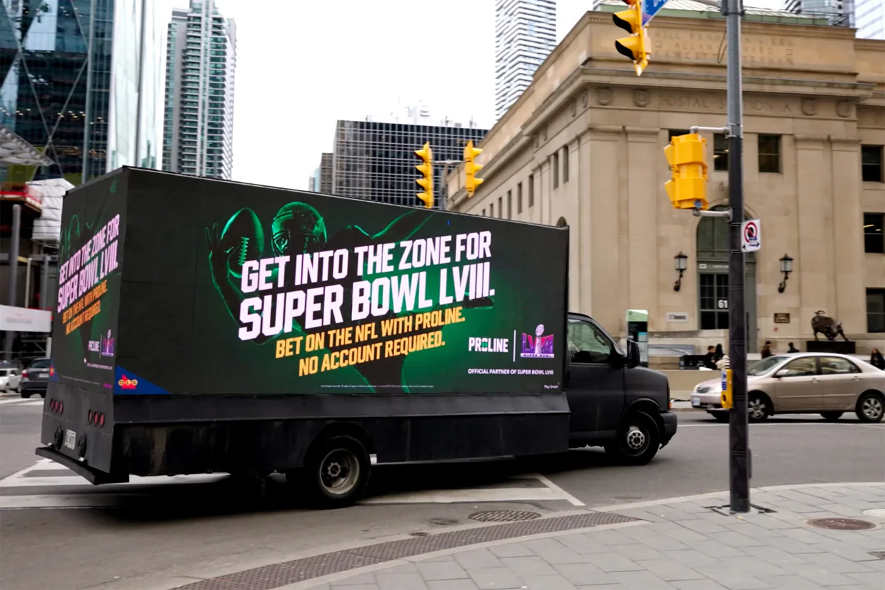 OLG Proline 'Get Into The Zone For Super Bowl LVIII' full digital mobile billboard truck in downtown Toronto (Statements Media)
