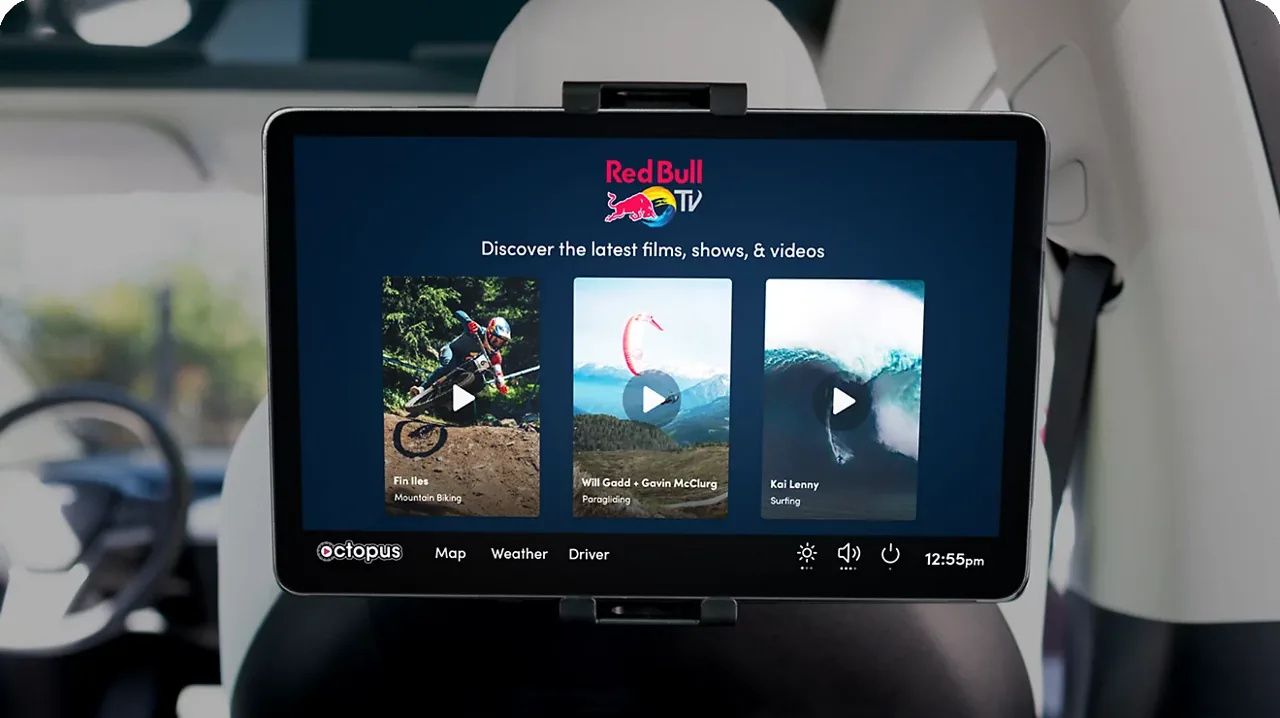 Head-on view of the backseat-facing rideshare tablet and ad interface (T-Mobile Advertising Solutions in-car screen)