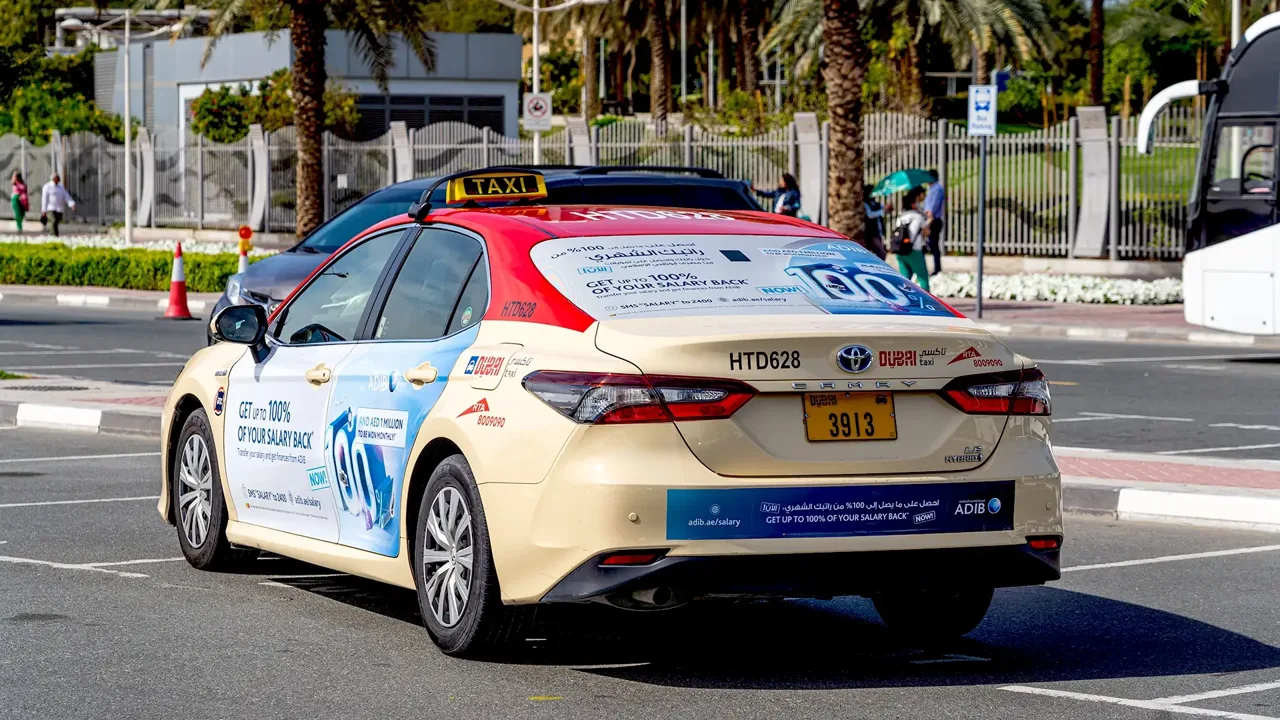 ADIB 550-taxi campaign across the UAE, secondary vehicle shot (Taxi Advertising)