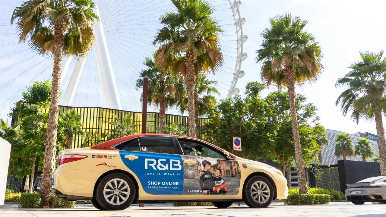R&B (Apparel Group) fashion taxi takeover full wrap on a Dubai taxi (Taxi Advertising)