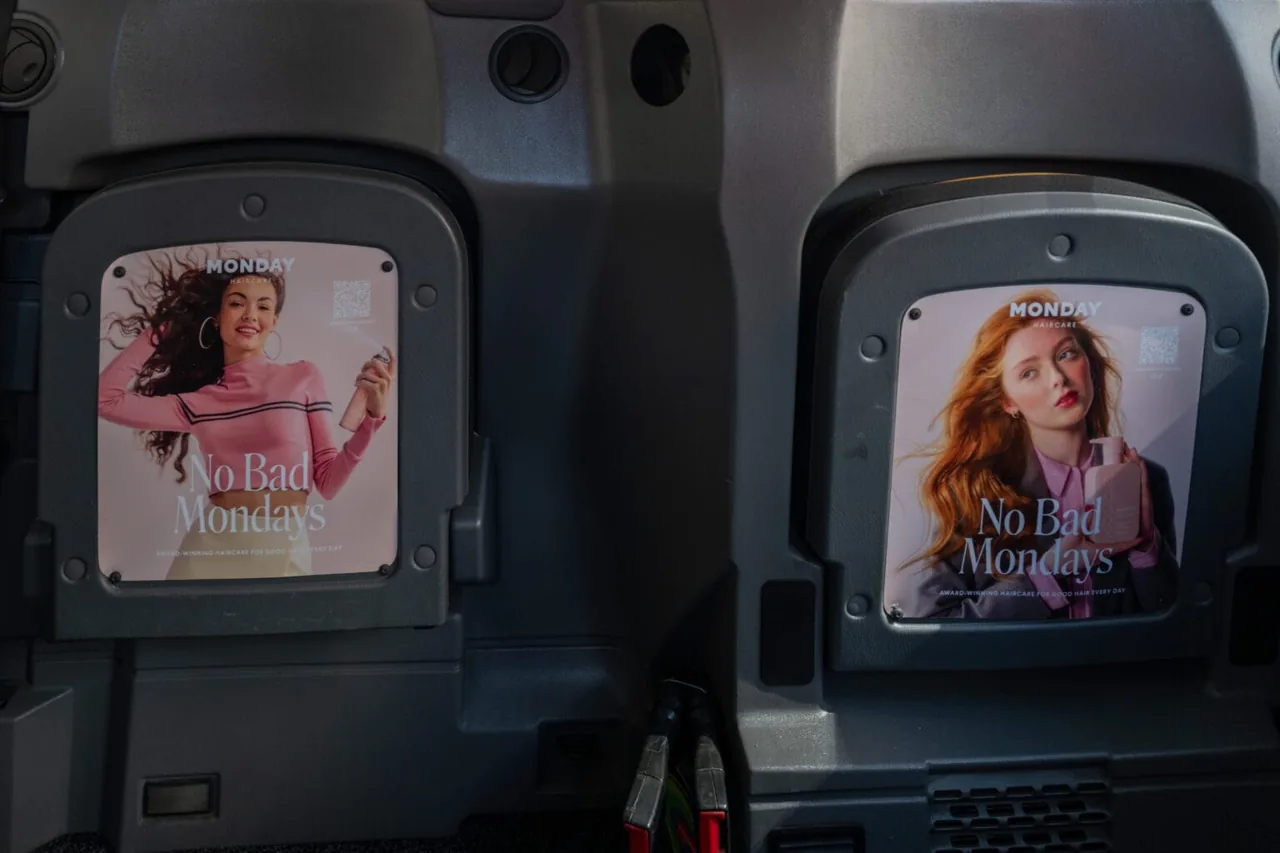 Monday Haircare tip-seat interior advertising panels inside a London taxi (Taxi Wraps)