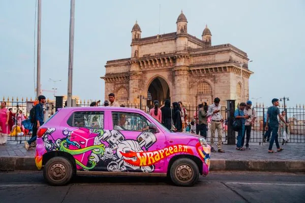 Full car-wrap cab-branding job documented in Wrap2Earn's 'What is Car Wrap Advertising?' post