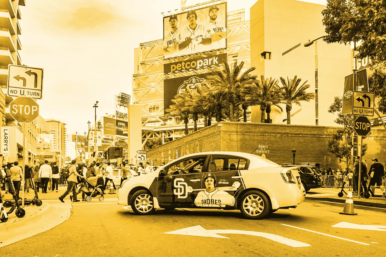 San Diego Padres (MLB) full car wrap featuring Manny Machado, driving outside Petco Park