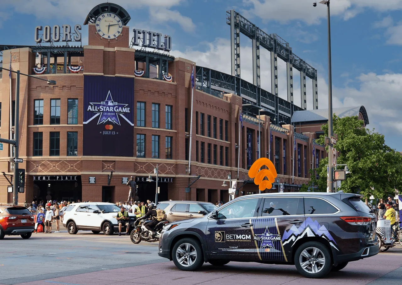 BetMGM x MLB All-Star Game full SUV wrap passing Coors Field, Denver