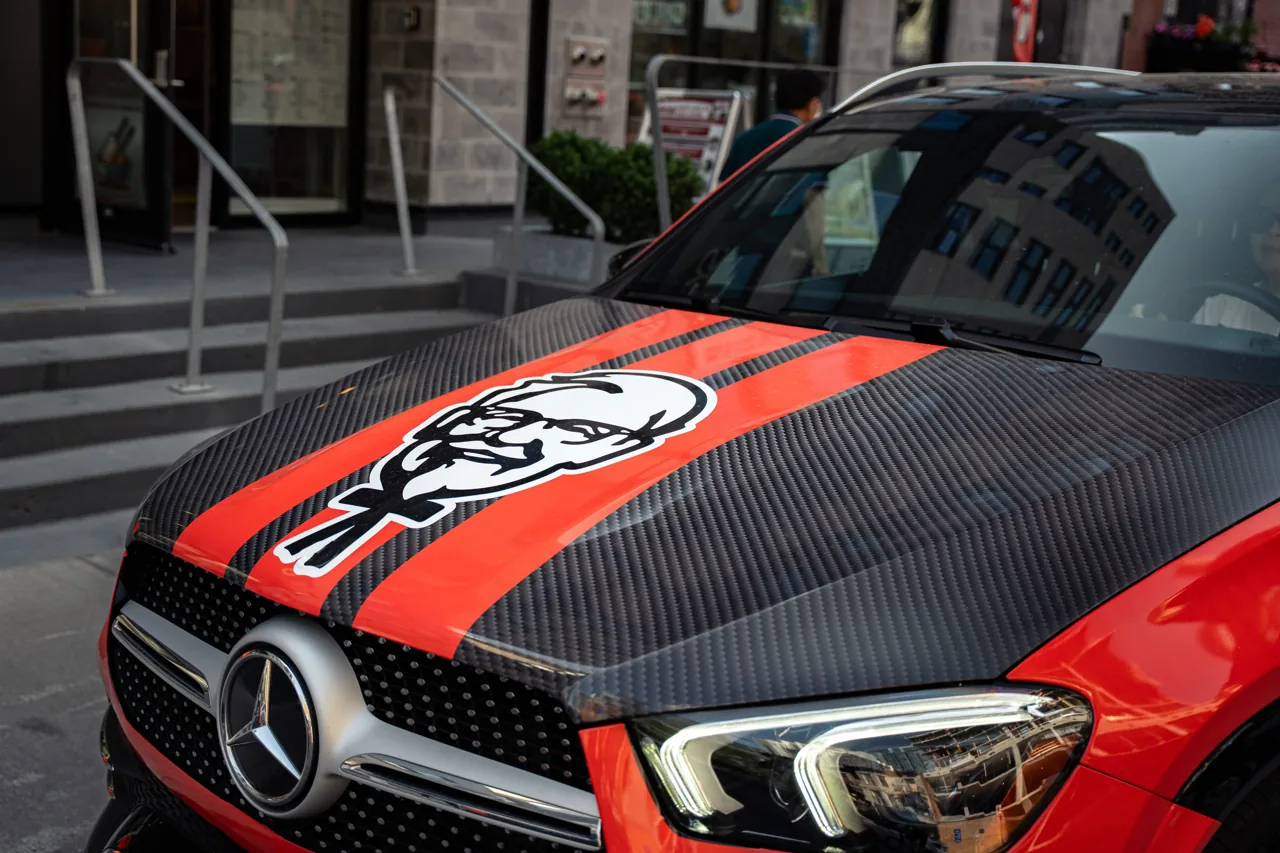 KFC branded full-vehicle rideshare/car wrap (Wrapped Media campaign)